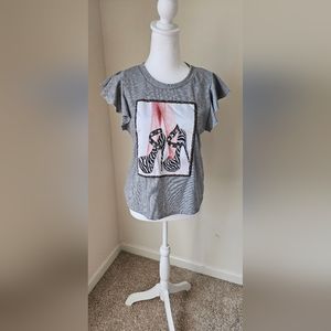 Girls(junior) gray top with silver fashion jewelry on it. Size(L). Used